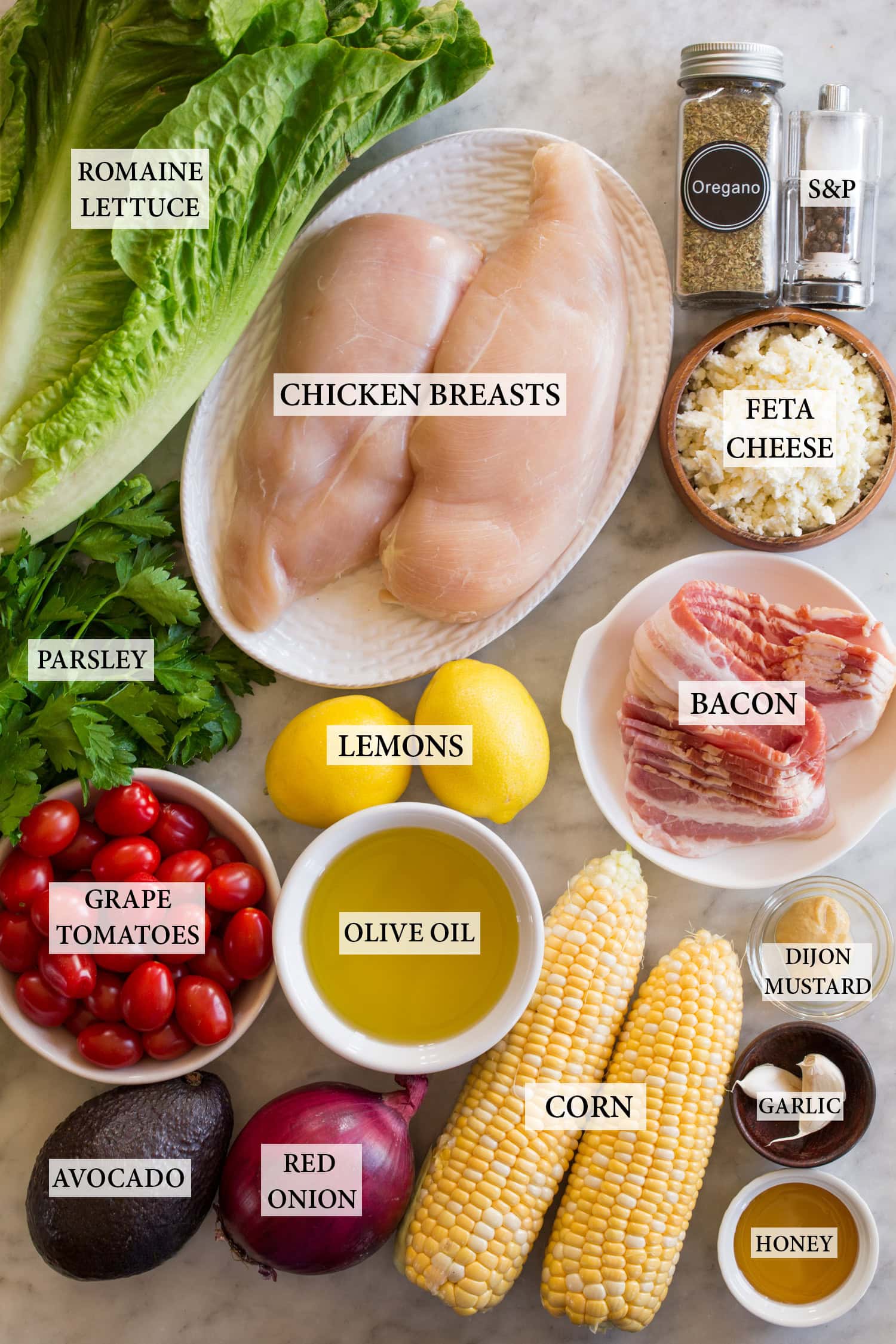 Ingredients used to make a grilled chicken salad.