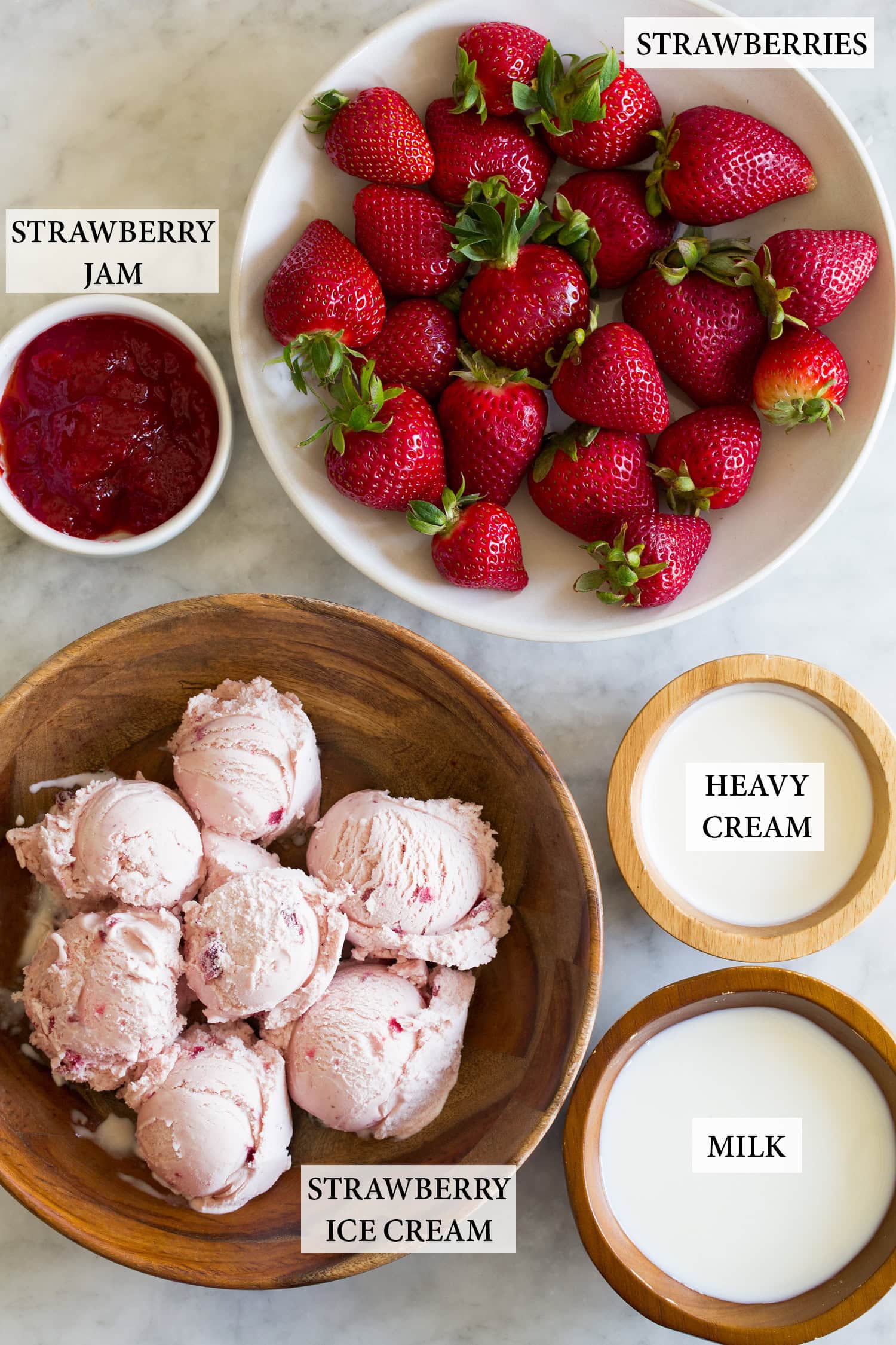 Ingredients used to make fresh strawberry milkshakes.